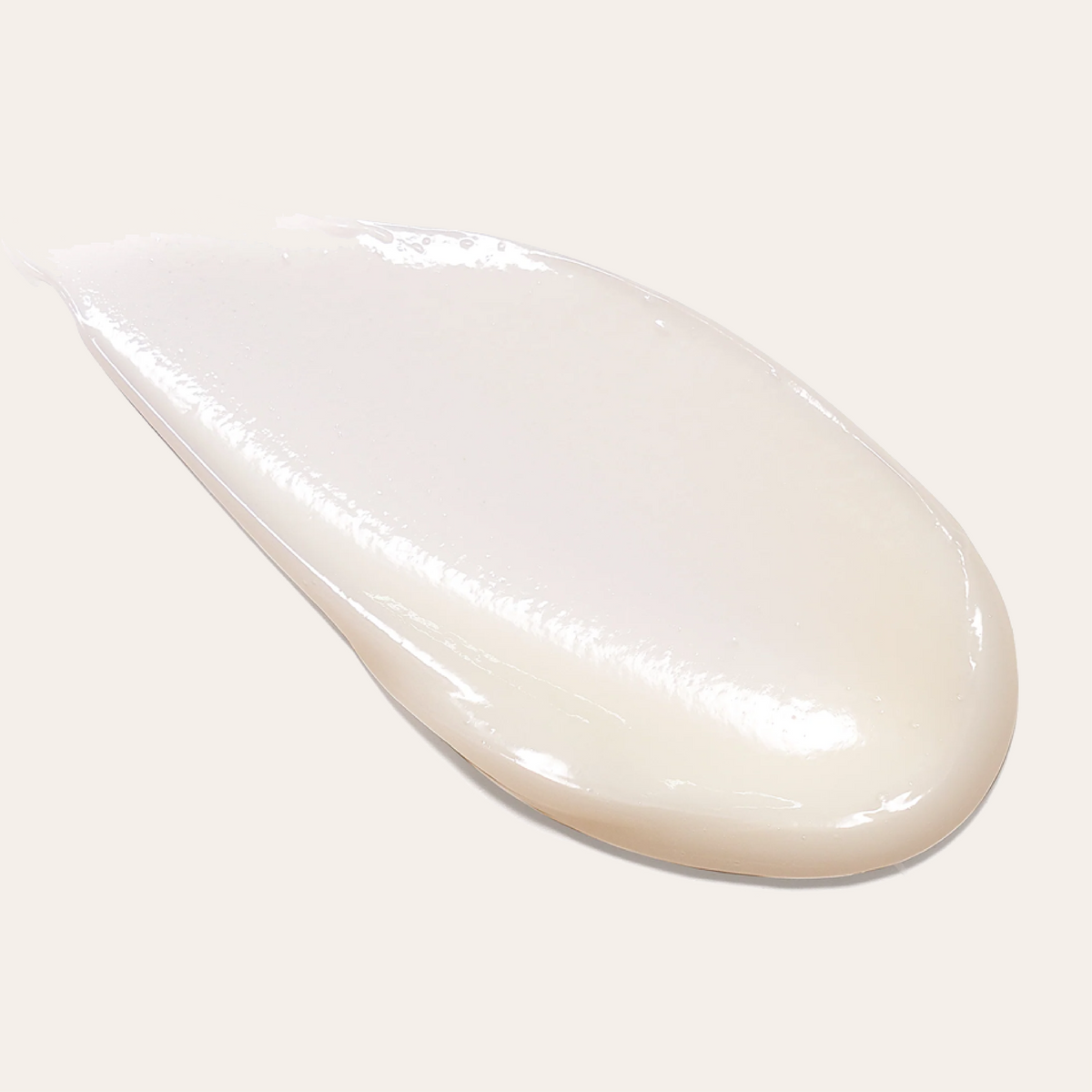 L'ANZA hair treatment cream texture shown on a light background