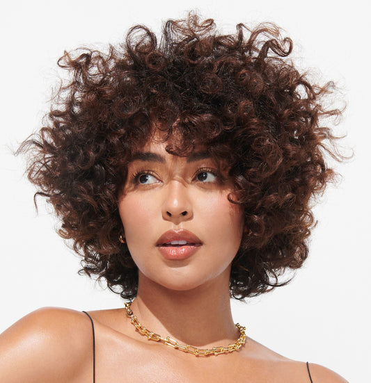 Image of model using Dry Shampoo product